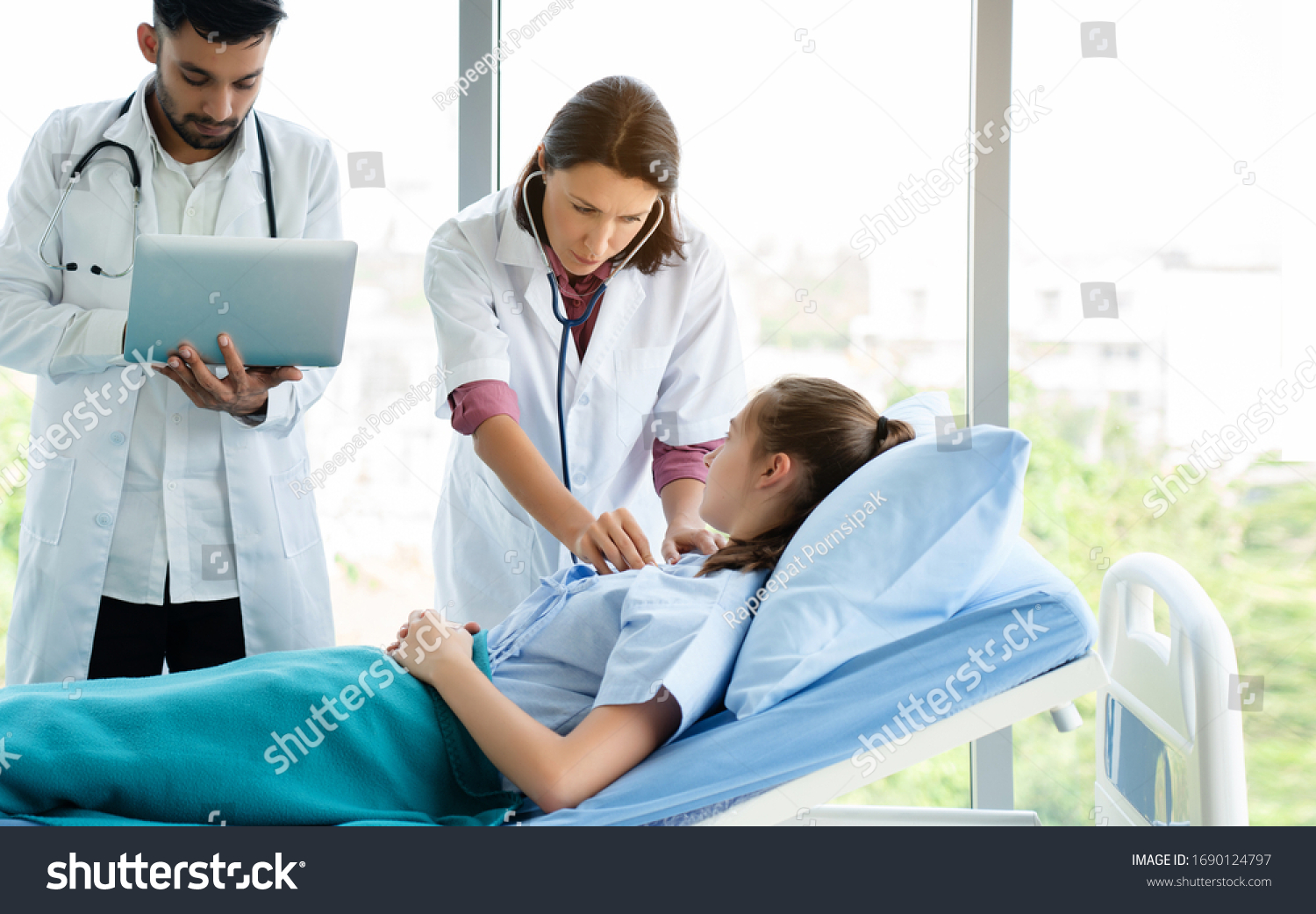 stock photo doctor treatment patients in hospital room medical professionals help treat sick people physical 1690124797