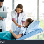 stock photo doctor treatment patients in hospital room medical professionals help treat sick people physical 1690124797